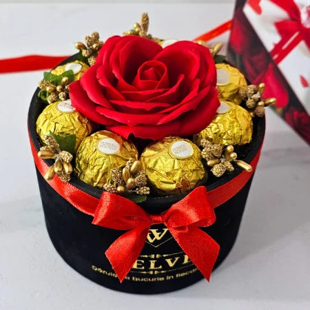 FLORAL ARRANGEMENT WITH A SOAP ROSE, GOLD STAMEN AND 8 Ferrero Rocher, BLACK VELVET BOX, RED