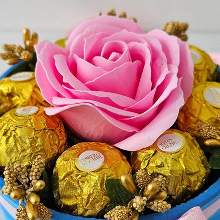 FLORAL ARRANGEMENT WITH A SOAP ROSE, GOLD STAMEN AND 8 Ferrero Rocher, BLUE BOX, PINK